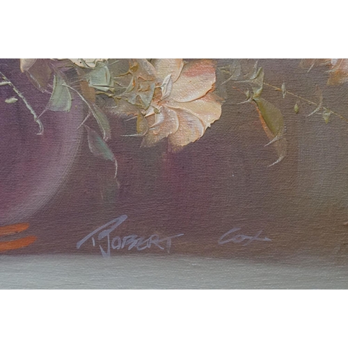 436 - Two framed oil on canvas still life flower paintings.