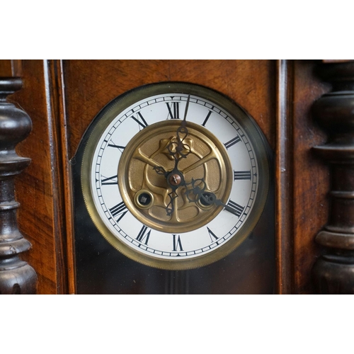 439 - A Vienna style mahogany cased two train wall clock.