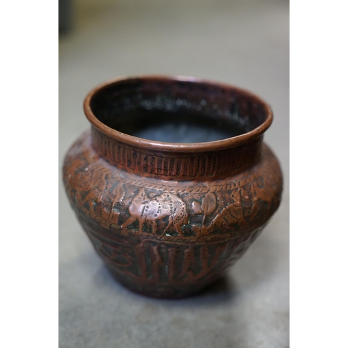 444 - A pair of antique copper kettles.