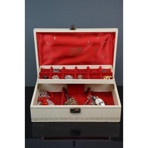 362 - A vintage jewellery box with contents to include hallmarked silver pendant, costume jewellery and wa... 