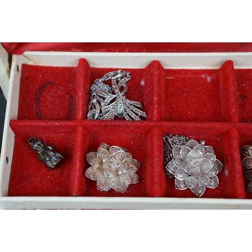 362 - A vintage jewellery box with contents to include hallmarked silver pendant, costume jewellery and wa... 