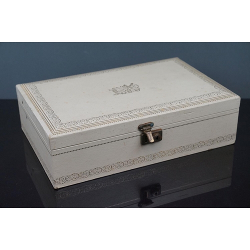 362 - A vintage jewellery box with contents to include hallmarked silver pendant, costume jewellery and wa... 