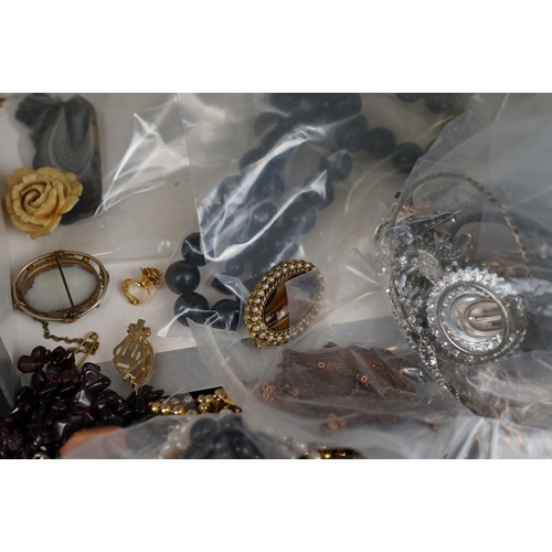 363 - A collection of mainly vintage costume jewellery.