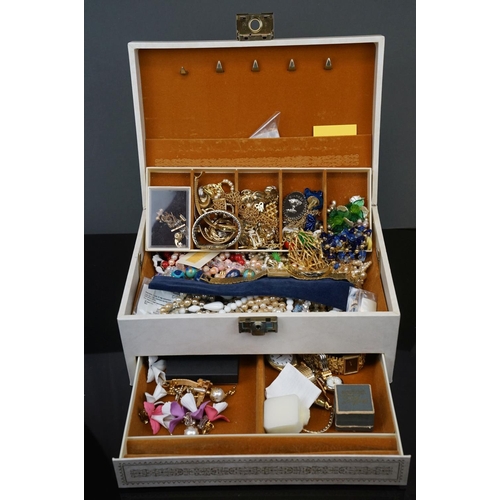 366 - A collection of mainly vintage costume jewellery contained within a vintage jewellery box.