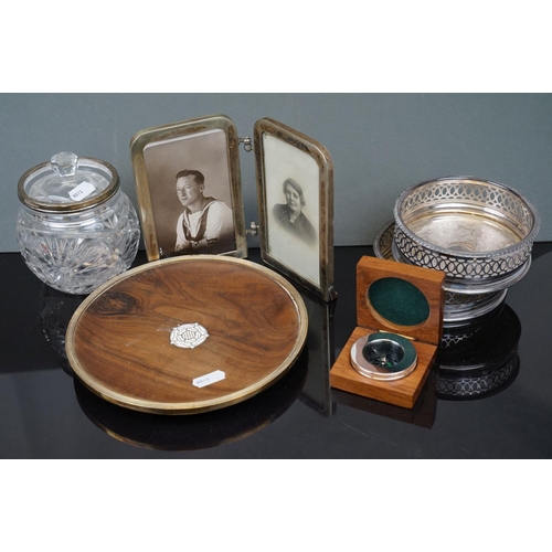 367 - A box of mixed collectables to include two bottle coasters, a folding double photograph frame and a ... 