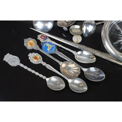 373 - A collection of silver plated crested spoons together with other silver plated cutlery to include a ... 