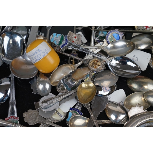 373 - A collection of silver plated crested spoons together with other silver plated cutlery to include a ... 