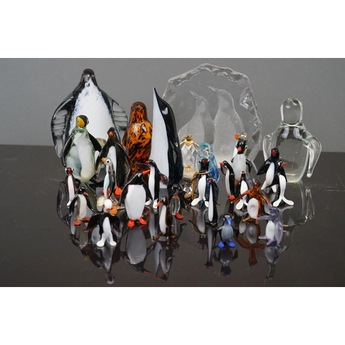 381 - A collection of glass Penguin figures to include Wedgewood and Murano examples.