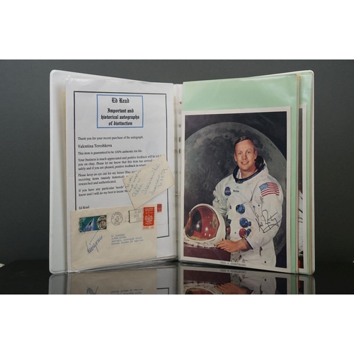 395 - A collection of space flight ephemera to include first day covers and signed photographs.