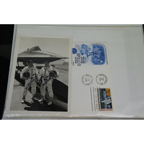 395 - A collection of space flight ephemera to include first day covers and signed photographs.