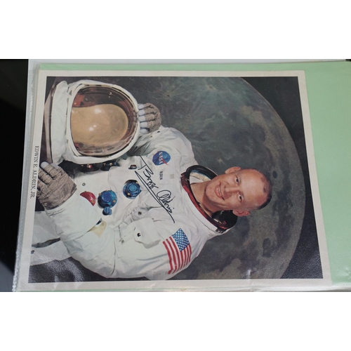 395 - A collection of space flight ephemera to include first day covers and signed photographs.