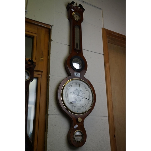 401 - An antique mahogany cased L Martinelli of London banjo Barometer.