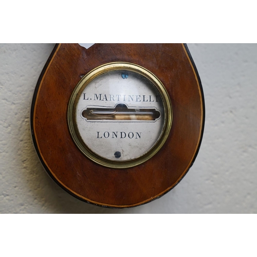 401 - An antique mahogany cased L Martinelli of London banjo Barometer.