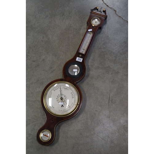 402 - An antique Kidby Weeley mahogany cased banjo barometer.