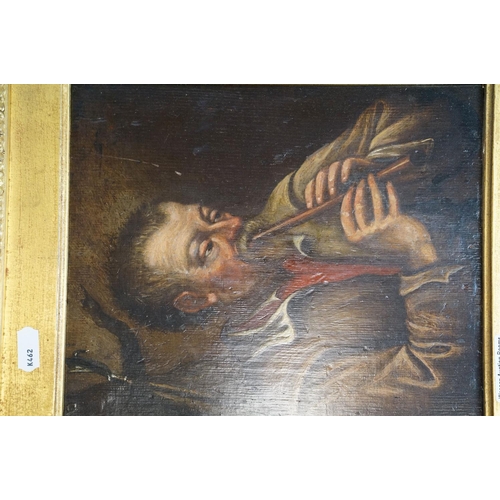 415 - A 19th century oil on panel, Continental portrait of a man playing a flute, mounted in an ornate gil... 