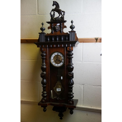 439 - A Vienna style mahogany cased two train wall clock.