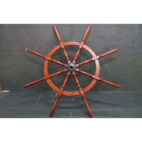 440 - A large Contemporary hardwood ships wheel, 150 cm in diameter.