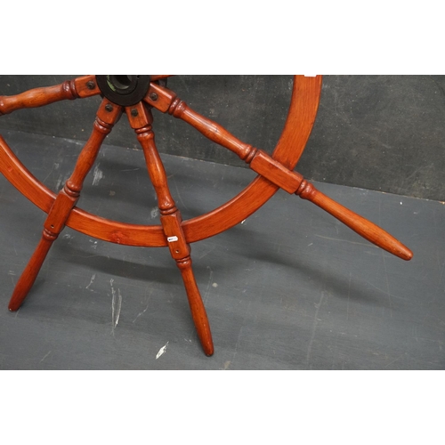 440 - A large Contemporary hardwood ships wheel, 150 cm in diameter.