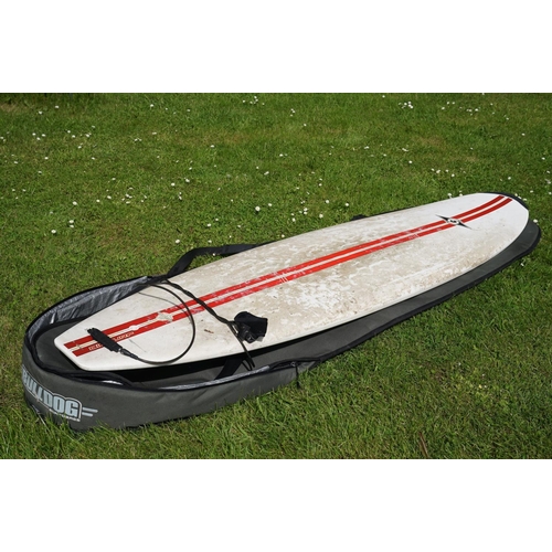 441 - A full size Bicsurf three fin surf board in a Bulldog 7ft 6in board bag.