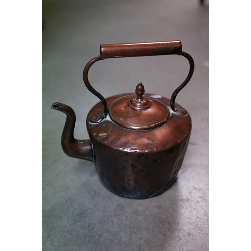 444 - A pair of antique copper kettles.