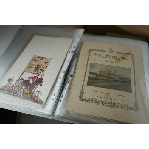 455 - Two boxes of mixed ephemera to include tea cards, postcards and books.