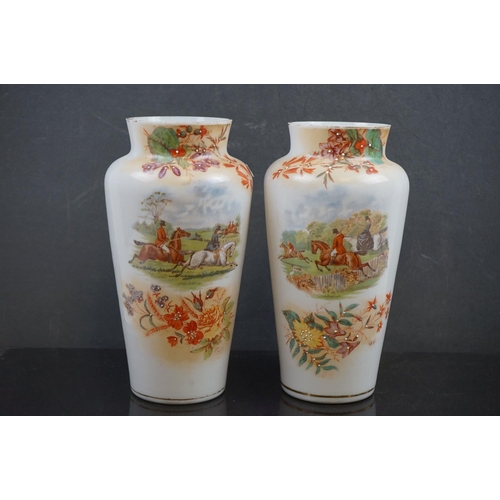 464 - An oriental Blanc de chine pierced vase together with a pair of early 20th century vases with huntin... 