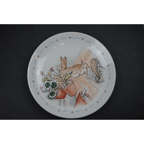 469 - A collection of ceramic children's plates to include Wedgwood Peter Rabbit examples.