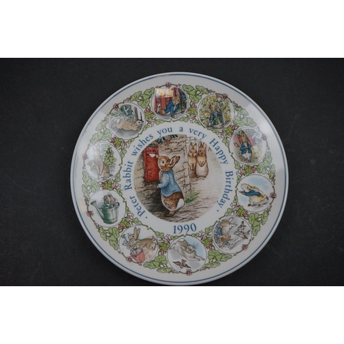 469 - A collection of ceramic children's plates to include Wedgwood Peter Rabbit examples.