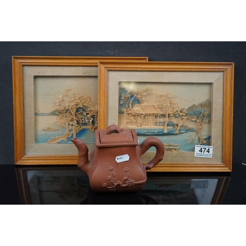 474 - Two Japanese framed cork pictures together with a Terracotta Yixing teapot.