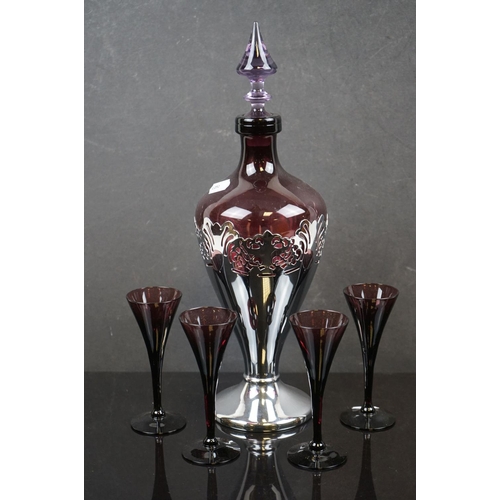 476 - Amethyst glass liqueur carafe by Faber Bros of New York together with Four Glasses