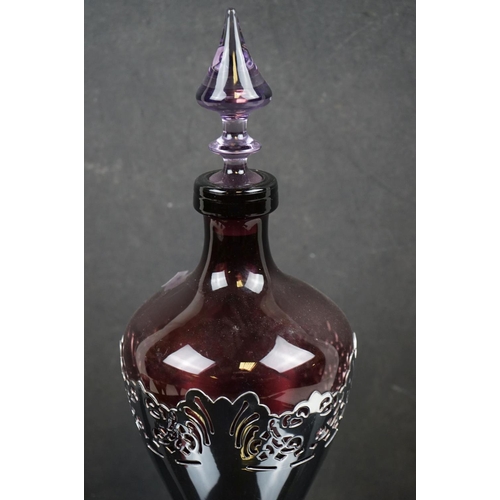 476 - Amethyst glass liqueur carafe by Faber Bros of New York together with Four Glasses