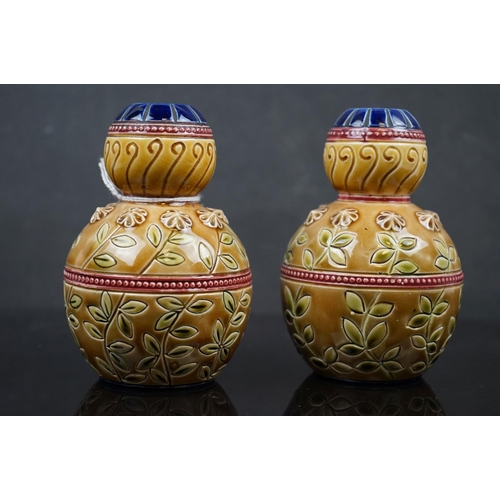 477 - A pair of continental floral decorative bud vases.