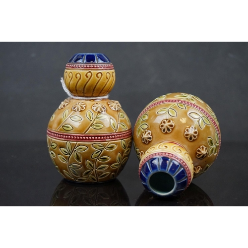 477 - A pair of continental floral decorative bud vases.