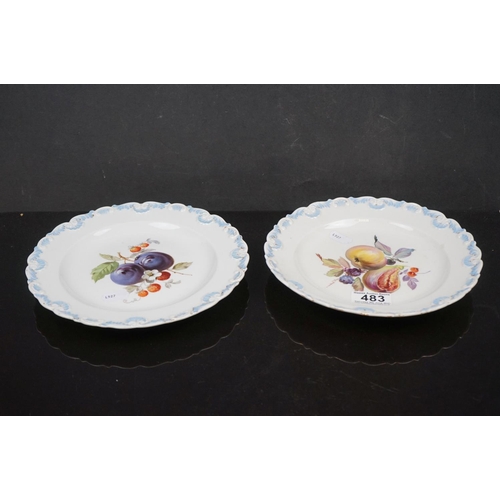 483 - A pair of 20th century Meissen plates with fruit decoration and shell decoration to edges.