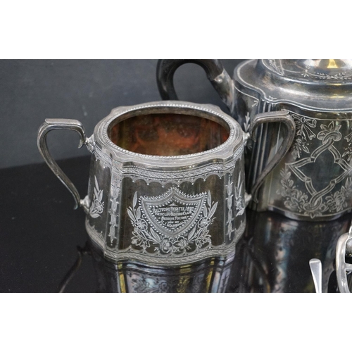 487 - A collection of silver plate to include coffee pot, toast racks and cruet set.