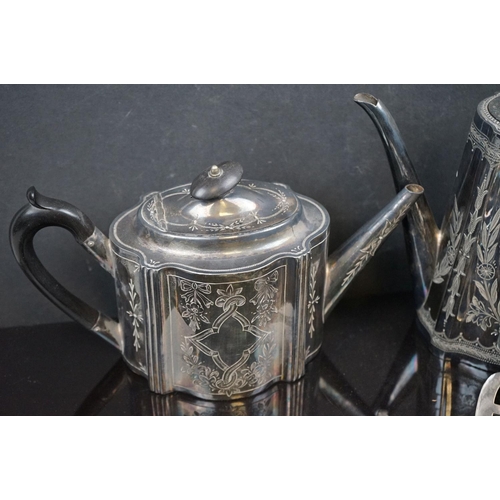 487 - A collection of silver plate to include coffee pot, toast racks and cruet set.