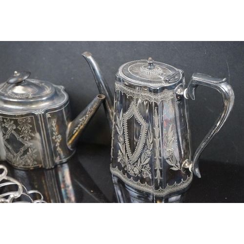 487 - A collection of silver plate to include coffee pot, toast racks and cruet set.