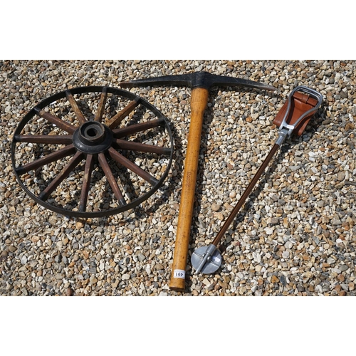 491 - A group of mixed collectables to include a hunting stick, a Morpic pick axe and a twelve spoke artil... 