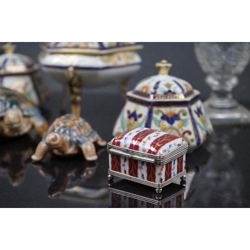 493 - A small collection of Noritake porcelain together with three Wade tortoises.