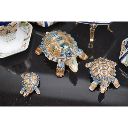 493 - A small collection of Noritake porcelain together with three Wade tortoises.