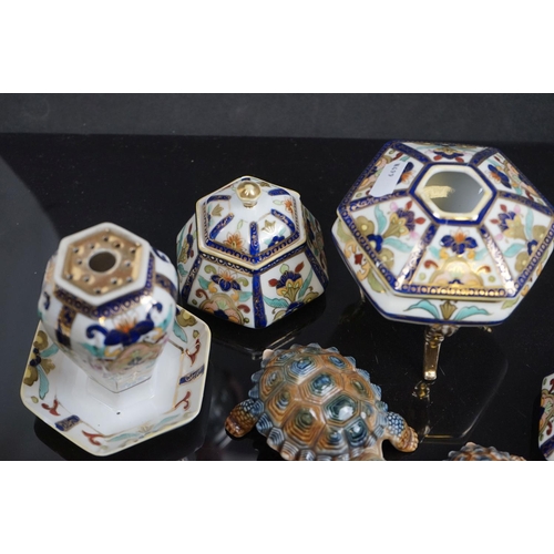 493 - A small collection of Noritake porcelain together with three Wade tortoises.