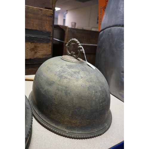 497 - Three antique silver plated Cloche's together with a wrought iron table lamp.