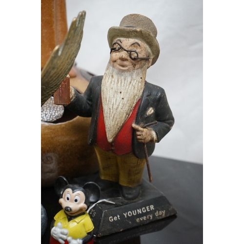 500 - A box of mixed collectables to include a Younger's keg ale brewery advertising figure, a table light... 