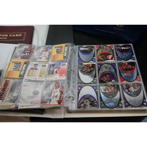 503 - A collection of Classic Disney Movies collector panels and stamps contained within two albums togeth... 