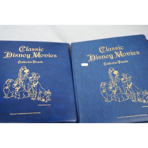 503 - A collection of Classic Disney Movies collector panels and stamps contained within two albums togeth... 