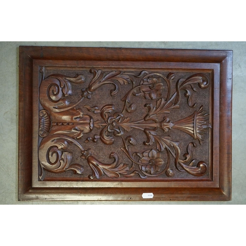 511 - A pair of carved wooden mahogany panels, measure approx 49 x 35cm