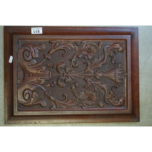 511 - A pair of carved wooden mahogany panels, measure approx 49 x 35cm