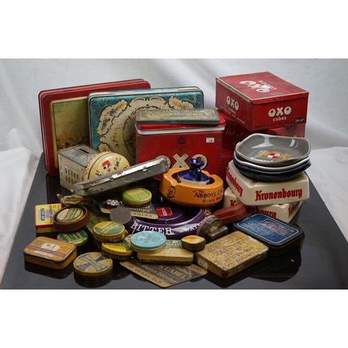 529 - A collection of advertising tins and ashtrays to include brewery examples.