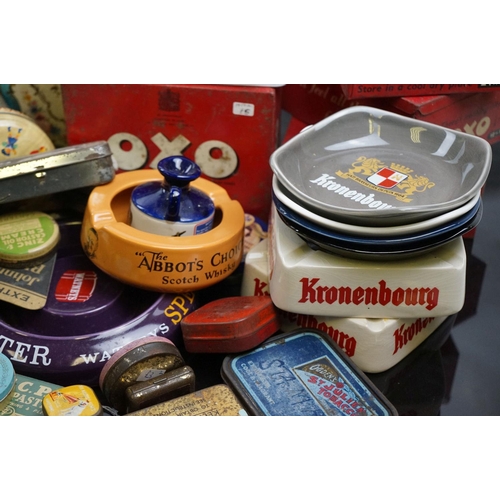 529 - A collection of advertising tins and ashtrays to include brewery examples.