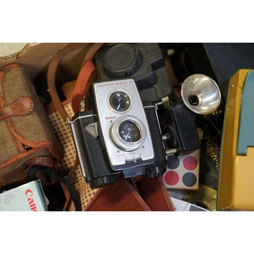 539 - A large collection of cameras and photographic equipment contained within two boxes to include Mamiy... 